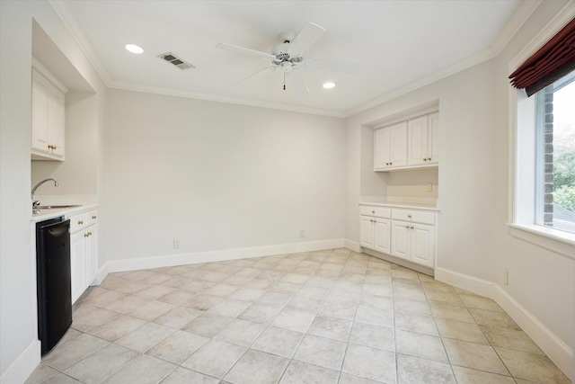 2 Wexford Ct, Piney Point Village, TX 77024 - kitchen with light countertops, a sink, healthy amount of natural light, black dishwasher, and crown molding