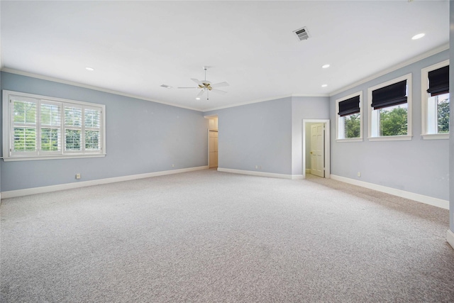 2 Wexford Ct, Piney Point Village, TX 77024 - spare room featuring crown molding, plenty of natural light, light colored carpet, baseboards, and recessed lighting