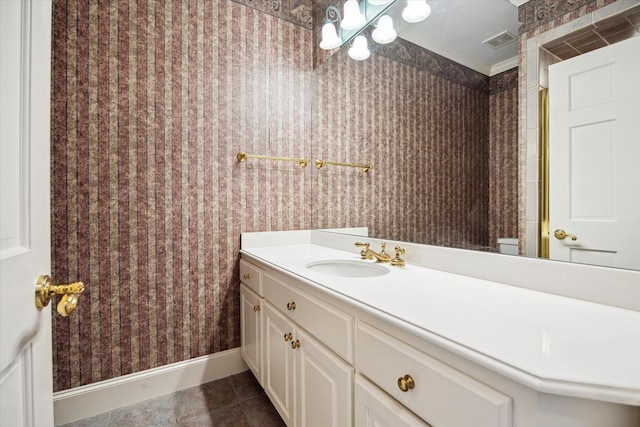 2 Wexford Ct, Piney Point Village, TX 77024 - bathroom with vanity, baseboards, tile patterned flooring, a chandelier, and wallpapered walls