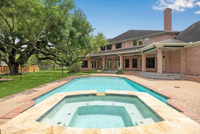 2 Wexford Ct, Piney Point Village, TX 77024 - view of swimming pool with a pool with connected hot tub and a patio area