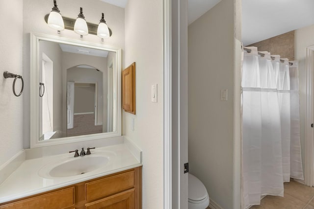full bath with vanity, tile patterned floors, toilet, and a shower with shower curtain