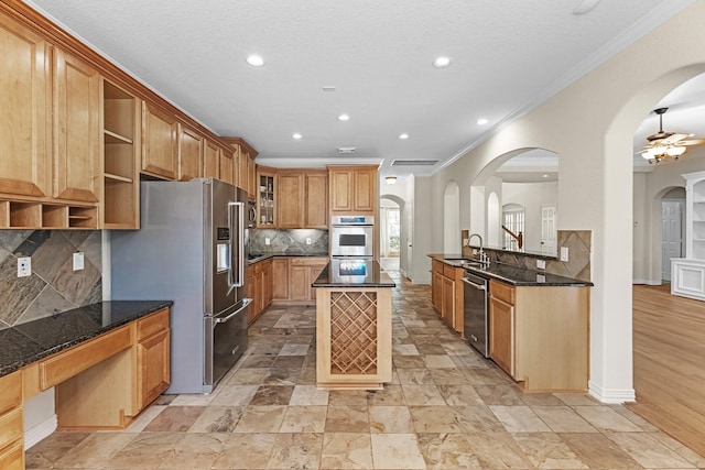 kitchen featuring decorative backsplash, crown molding, open shelves, a sink, and stainless steel appliances