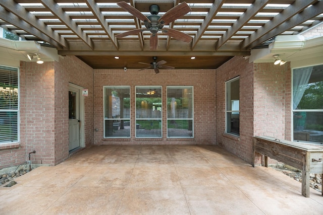 view of patio / terrace with a pergola and ceiling fan
