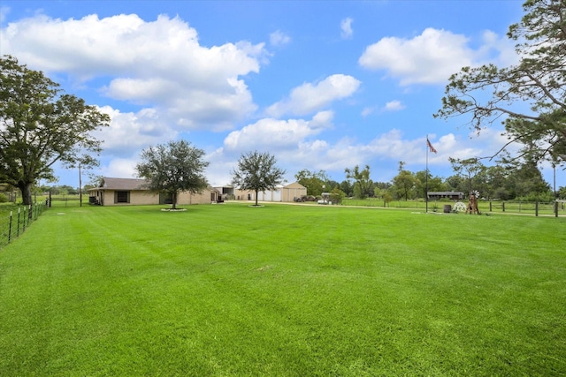 view of yard featuring fence