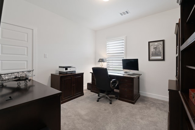 1025 Mission River Dr, Conroe, TX 77304 - office area featuring visible vents, light colored carpet, and baseboards
