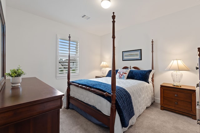 1025 Mission River Dr, Conroe, TX 77304 - bedroom with visible vents and light colored carpet