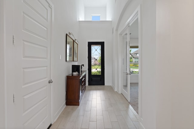 1025 Mission River Dr, Conroe, TX 77304 - foyer featuring a wealth of natural light and baseboards