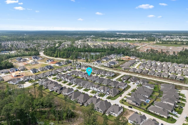 1025 Mission River Dr, Conroe, TX 77304 - drone / aerial view with a residential view