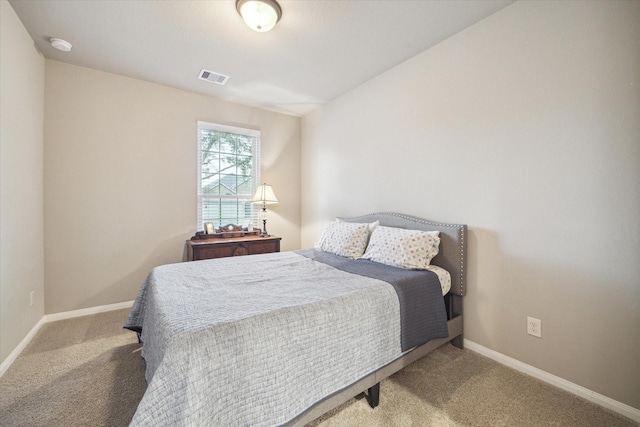 8143 Black Percher St, Conroe, TX 77385 - carpeted bedroom featuring baseboards