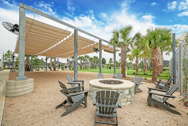 8143 Black Percher St, Conroe, TX 77385 - view of patio with a fire pit