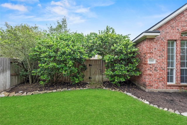 view of yard with fence