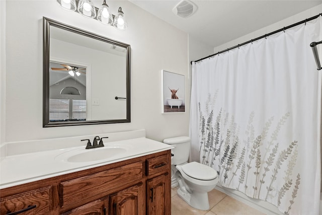 bathroom with vanity, tile patterned flooring, toilet, and a shower with shower curtain