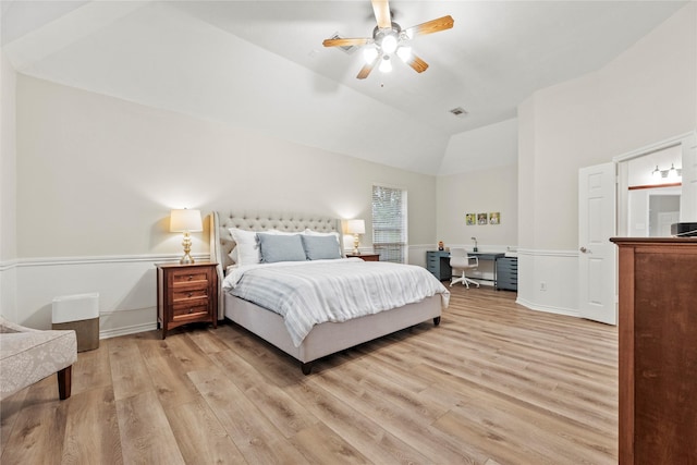 bedroom featuring light wood-style floors, high vaulted ceiling, and a ceiling fan