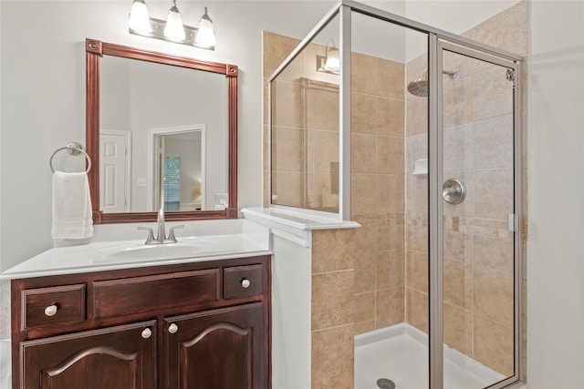 full bath featuring a shower stall and vanity