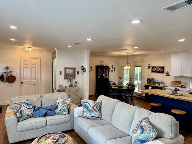 211 Southern Oaks Dr, Lake Jackson, TX 77566 - living area featuring visible vents and dark wood-type flooring