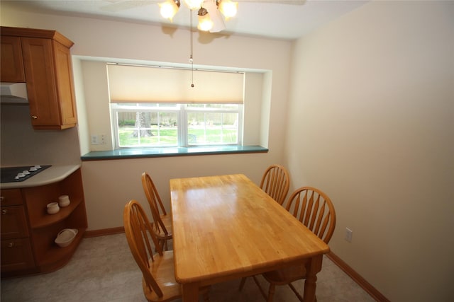 16514 Laurelfield Dr, Houston, TX 77059 - dining room with a ceiling fan and baseboards