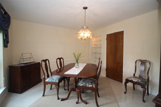 16514 Laurelfield Dr, Houston, TX 77059 - dining space with a chandelier and light tile patterned floors