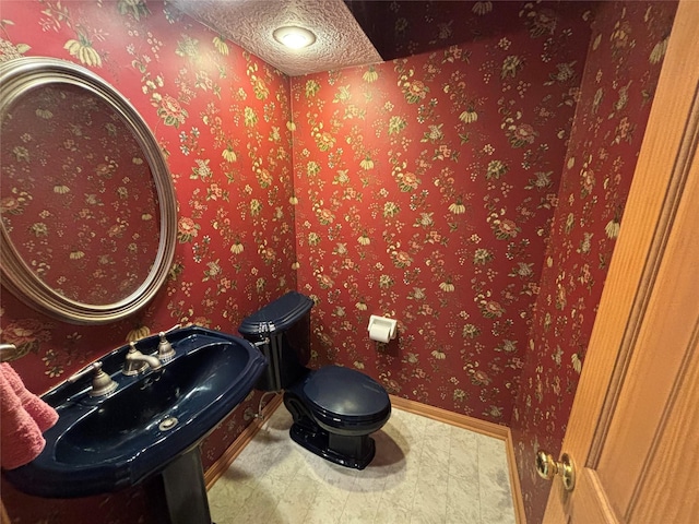 16514 Laurelfield Dr, Houston, TX 77059 - half bath with baseboards and toilet