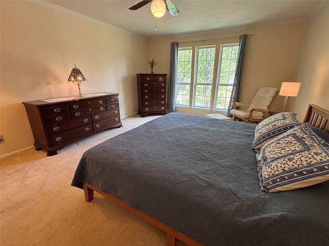 16514 Laurelfield Dr, Houston, TX 77059 - bedroom with light colored carpet, ornamental molding, a ceiling fan, baseboards, and a textured ceiling