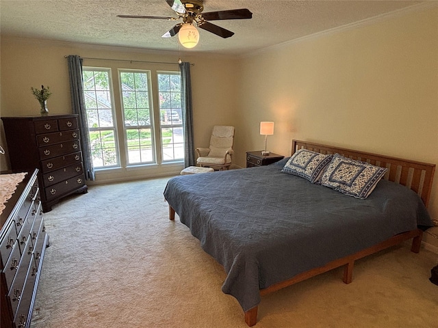 16514 Laurelfield Dr, Houston, TX 77059 - bedroom with carpet, ornamental molding, a textured ceiling, and ceiling fan