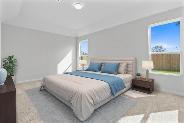 carpeted bedroom with baseboards