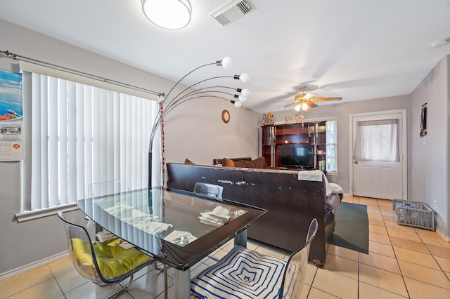 5930 Santa Bernadetta, Houston, TX 77017 - dining area with light tile patterned flooring, visible vents, a ceiling fan, and baseboards