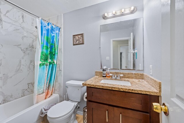5930 Santa Bernadetta, Houston, TX 77017 - full bath featuring shower / bath combo with shower curtain, toilet, and vanity