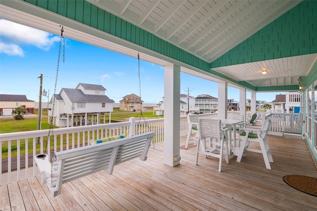3347 Prides Way, Crystal Beach, TX 77650 - wooden terrace with a residential view and outdoor dining area