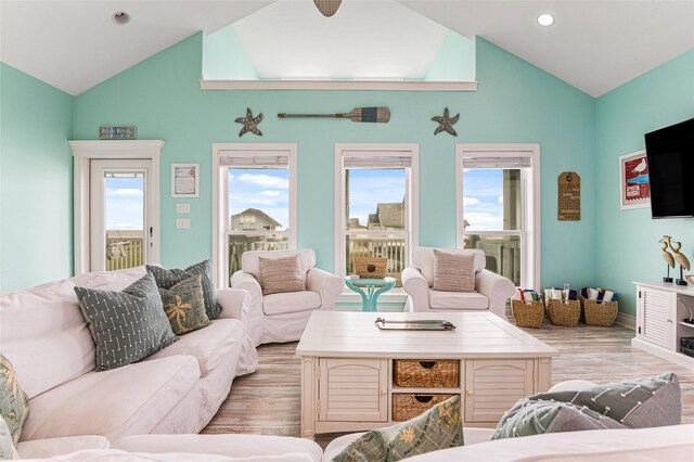 3347 Prides Way, Crystal Beach, TX 77650 - living room featuring recessed lighting, high vaulted ceiling, and light wood-type flooring