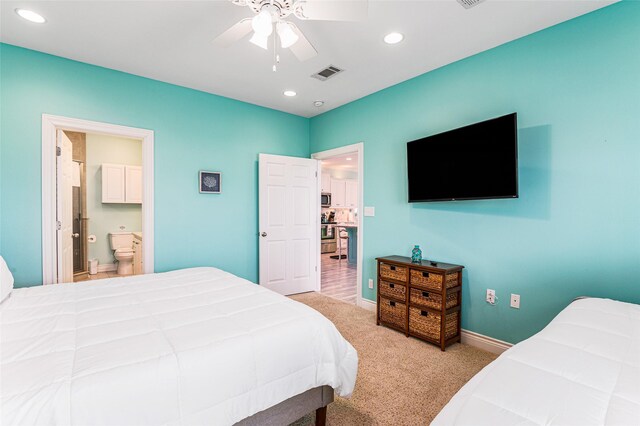3347 Prides Way, Crystal Beach, TX 77650 - bedroom with light colored carpet, visible vents, ensuite bathroom, baseboards, and recessed lighting