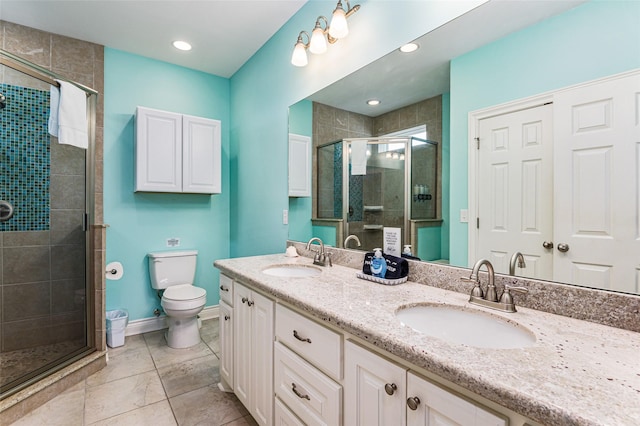 3347 Prides Way, Crystal Beach, TX 77650 - full bathroom with a stall shower, toilet, double vanity, and a sink