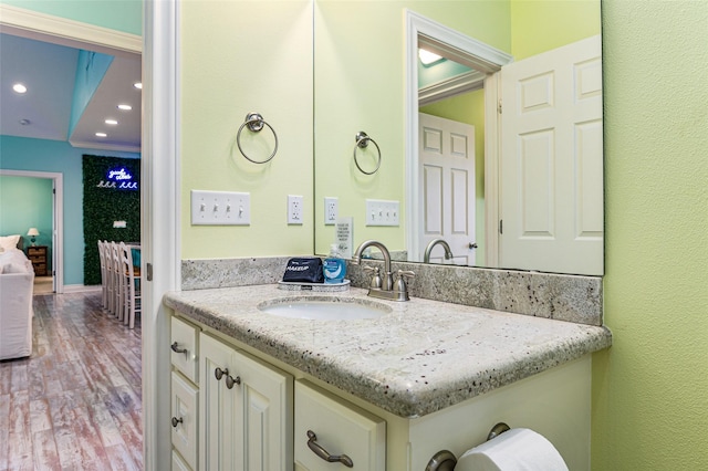 3347 Prides Way, Crystal Beach, TX 77650 - bathroom with recessed lighting, wood finished floors, and vanity
