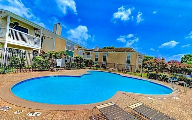 12660 Ashford Point Dr Unit 403, Houston, TX 77082 - community pool featuring fence
