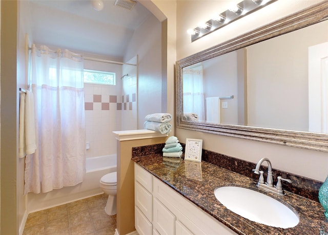 full bathroom featuring visible vents, bathing tub / shower combination, toilet, and vanity