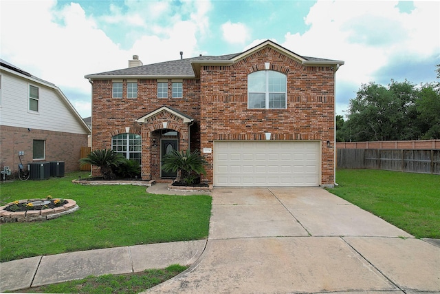traditional-style home featuring a chimney, brick siding, fence, a garage, and a front yard