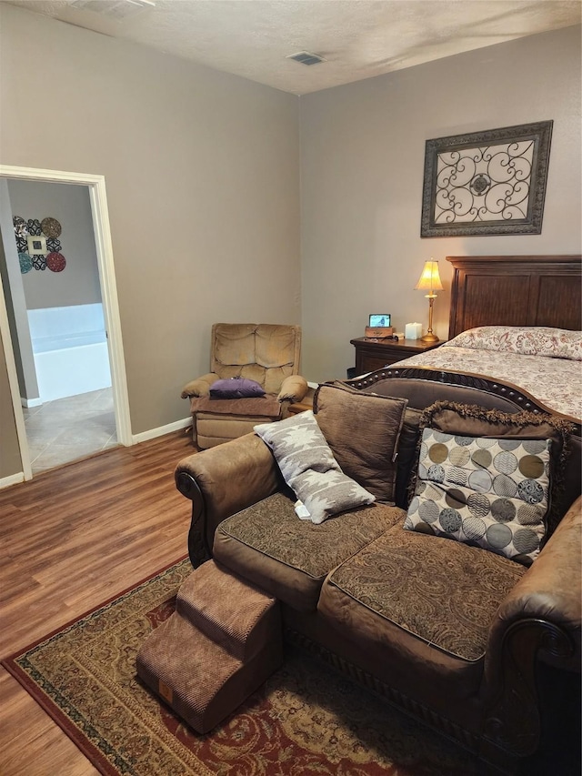 9316 Tejas Ct, La Porte, TX 77571 - bedroom with wood finished floors and baseboards