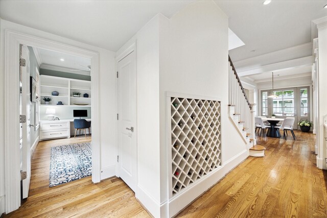 412 Redan St, Houston, TX 77009 - hall featuring stairs, light wood finished floors, recessed lighting, a desk, and baseboards