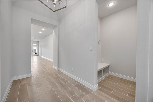 9306 Eckert Rd, Iowa Colony, TX 77583 - hallway featuring recessed lighting, wood finished floors, and baseboards