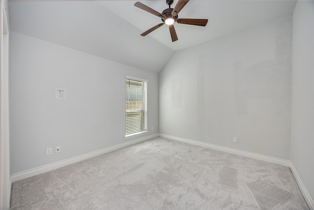 9306 Eckert Rd, Iowa Colony, TX 77583 - carpeted empty room with baseboards, a ceiling fan, and vaulted ceiling