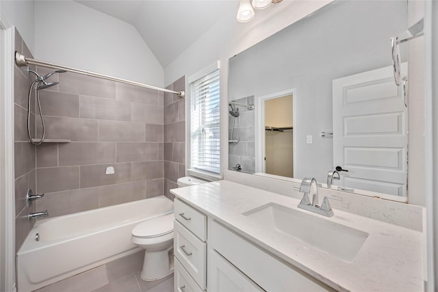 9306 Eckert Rd, Iowa Colony, TX 77583 - bathroom with tile patterned floors, bathing tub / shower combination, vaulted ceiling, toilet, and vanity