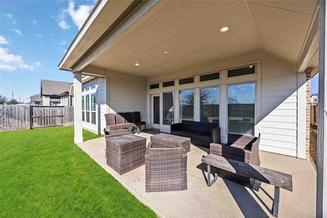 9306 Eckert Rd, Iowa Colony, TX 77583 - view of patio / terrace with outdoor lounge area and fence