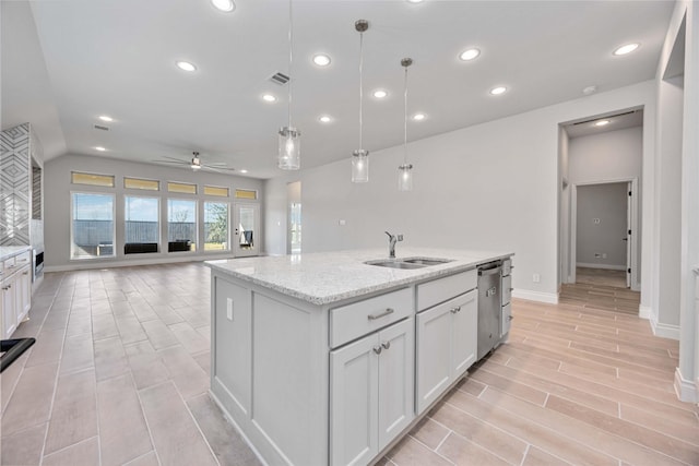 9306 Eckert Rd, Iowa Colony, TX 77583 - kitchen featuring recessed lighting, dishwasher, a sink, and a ceiling fan