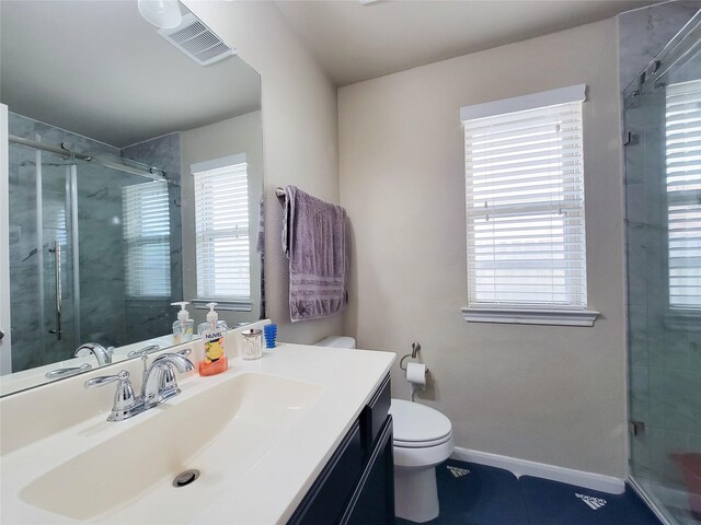 full bathroom with a shower stall, visible vents, baseboards, toilet, and vanity