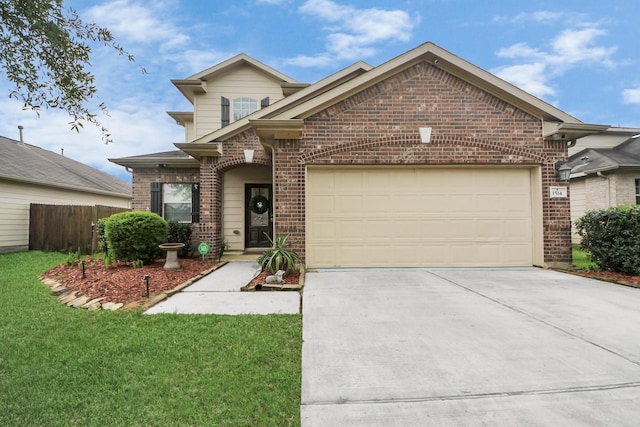 traditional-style home with brick siding, fence, a garage, driveway, and a front lawn