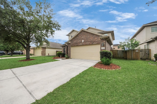 traditional-style house with a front lawn, a garage, brick siding, concrete driveway, and fence