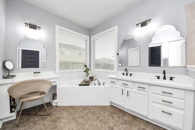 full bathroom featuring a garden tub and tile patterned floors