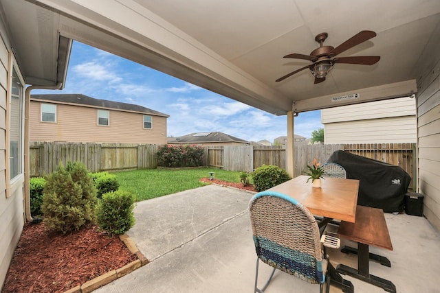 view of patio / terrace featuring outdoor dining space, ceiling fan, and a fenced backyard