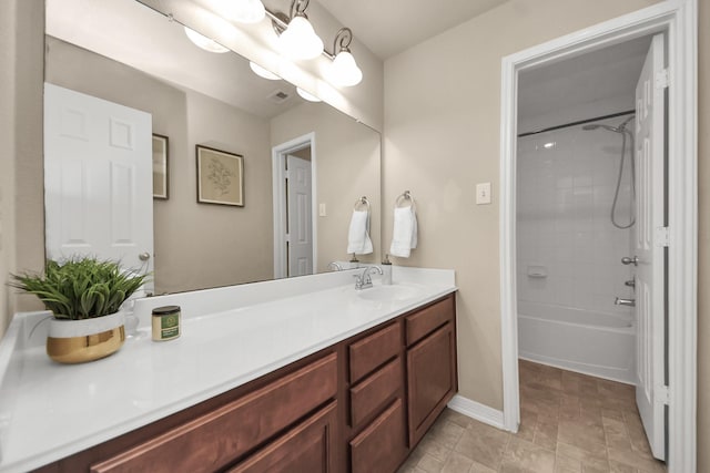 full bathroom featuring visible vents, bathing tub / shower combination, vanity, and baseboards