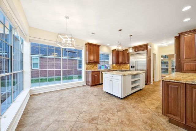 kitchen featuring open shelves, a healthy amount of sunlight, and decorative backsplash