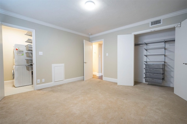 unfurnished bedroom with carpet flooring, a closet, visible vents, baseboards, and ornamental molding